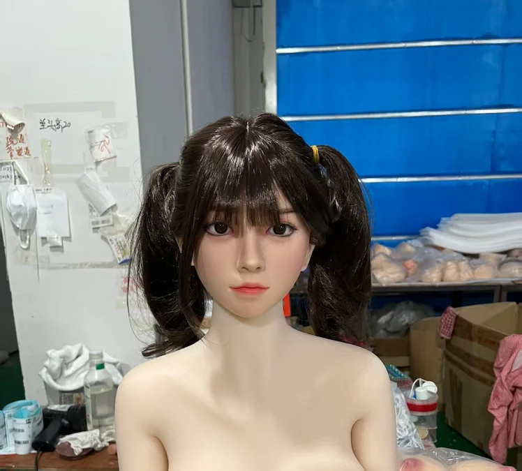 Silicone sex doll head paired with a TPE body showing a visible color difference at the neck